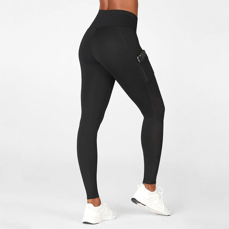 Performance legging met zakken